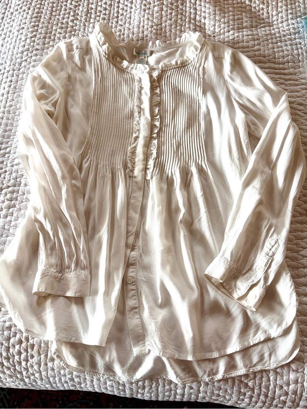 Women’s Cream Pintuck Ruffle Button-Front Blouse from Sundance.